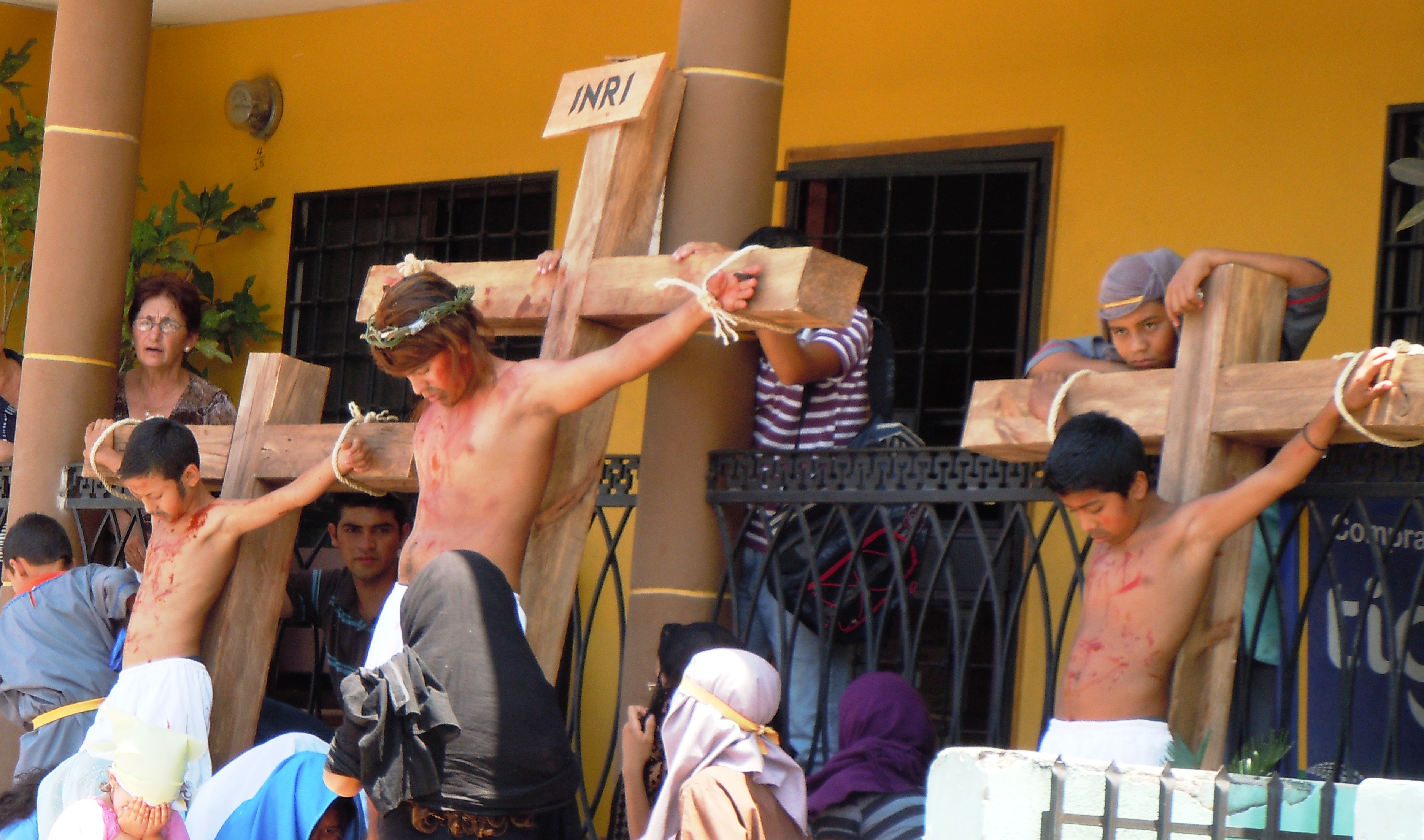 Children of Esquias perform Stations of the Cross on Good Friday