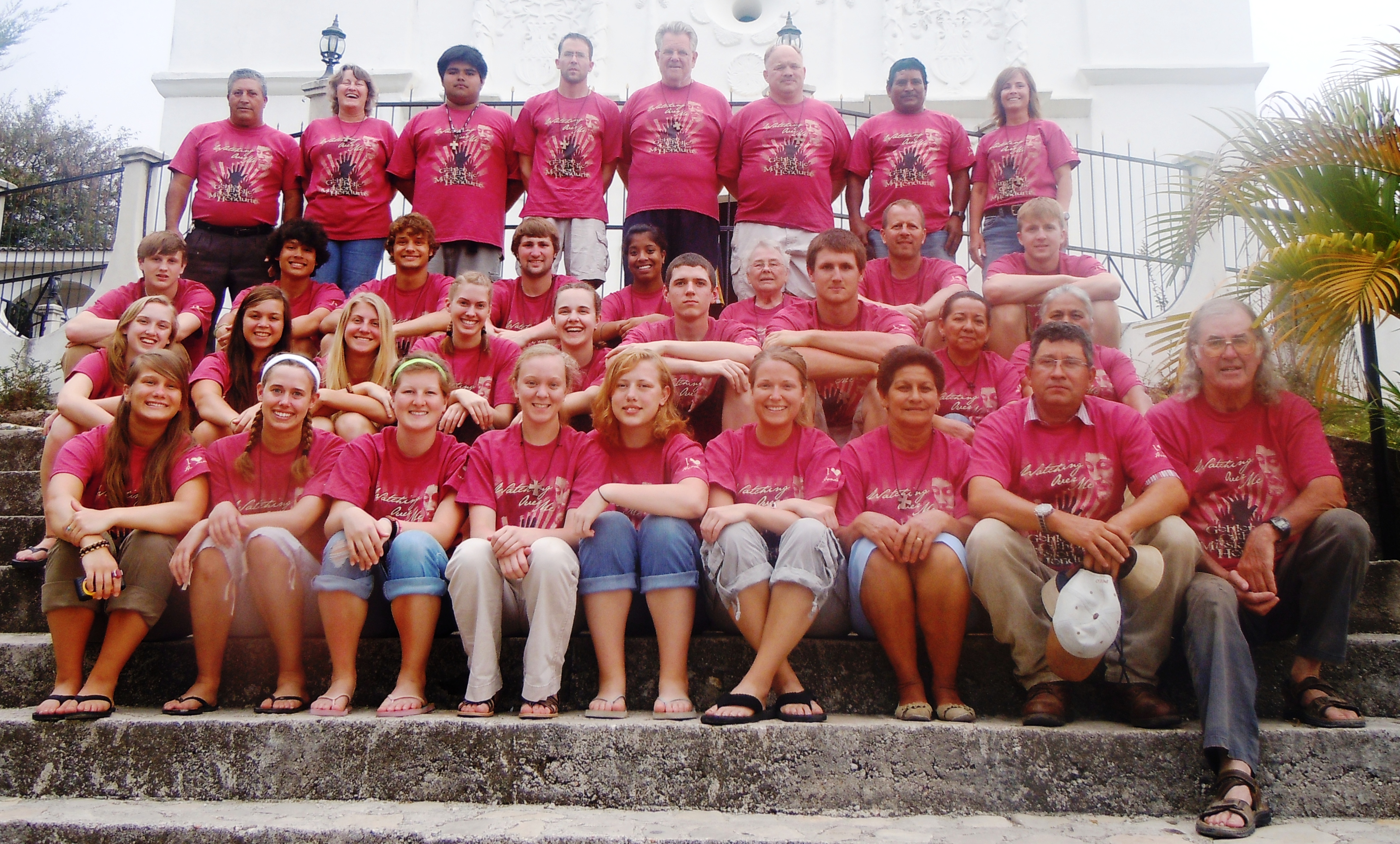 Missioners pose on church steps in Esquias, Honduras