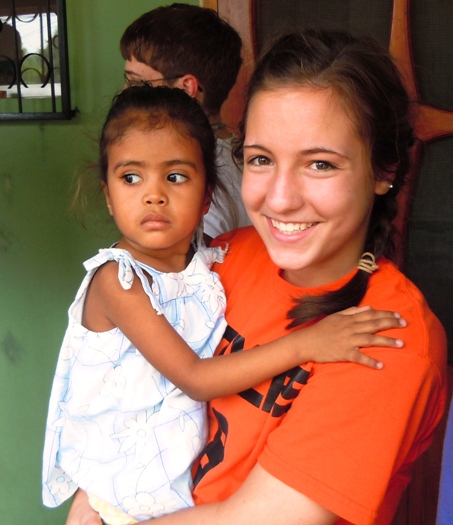 Becca Vonnahme holds a little girl at the malnutrition center in Sulaco