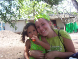 Kara Krienert with a young girl from the orphanage