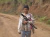 young boy with a machete