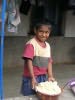 young boy with his ground maize