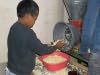 grinding maize