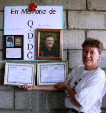 Carolyn Bickford displays the plaque after the annex dedication