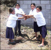 Students try the water spigot at school