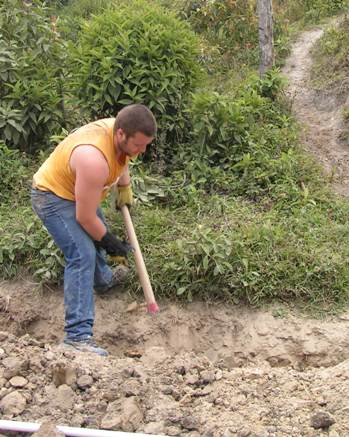 Nick Wankum wields a pick-axe