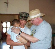 holding the children at the malnutrition center